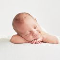 newborn-boy-on-white-background